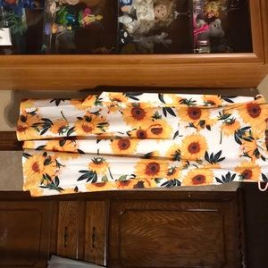 Sunflower dress never been worn.